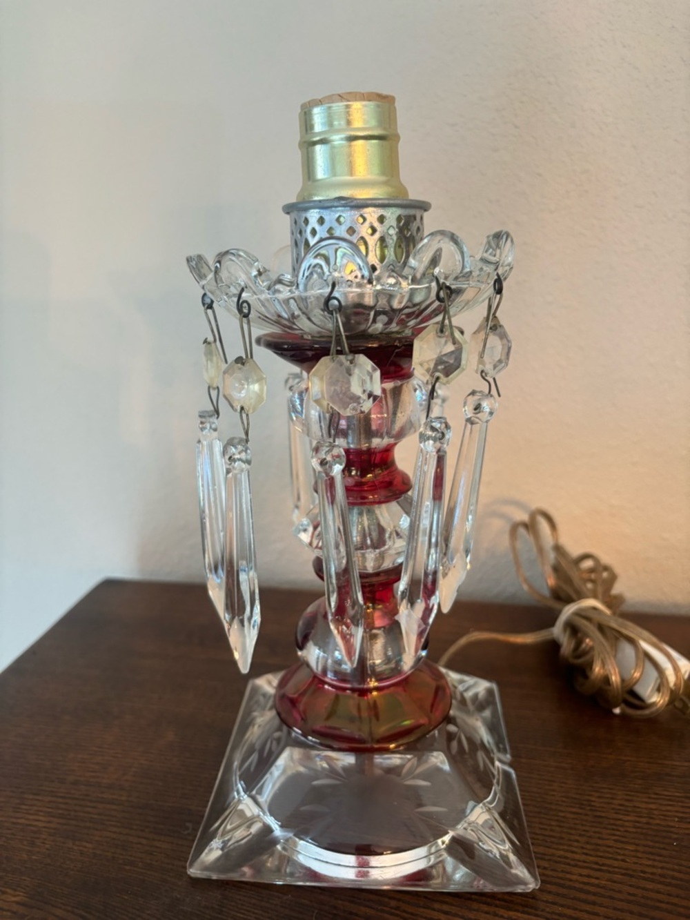 vintage boudoir table lamp featuring cranberry red and clear cut glass